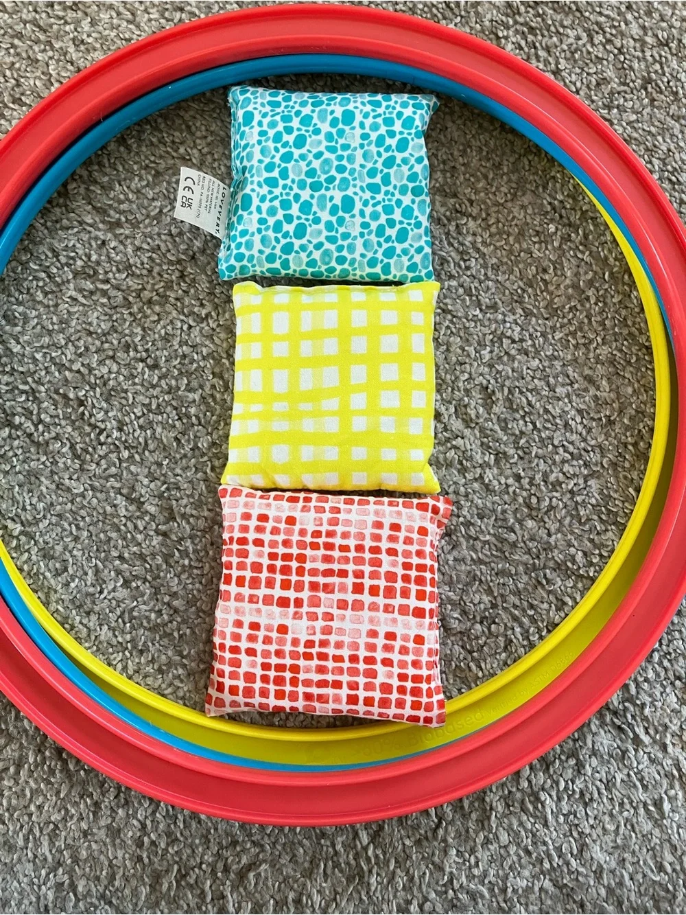 Lovevery Jump-In Eco Hoops & Bean Bags Set - Red, Yellow, Blue